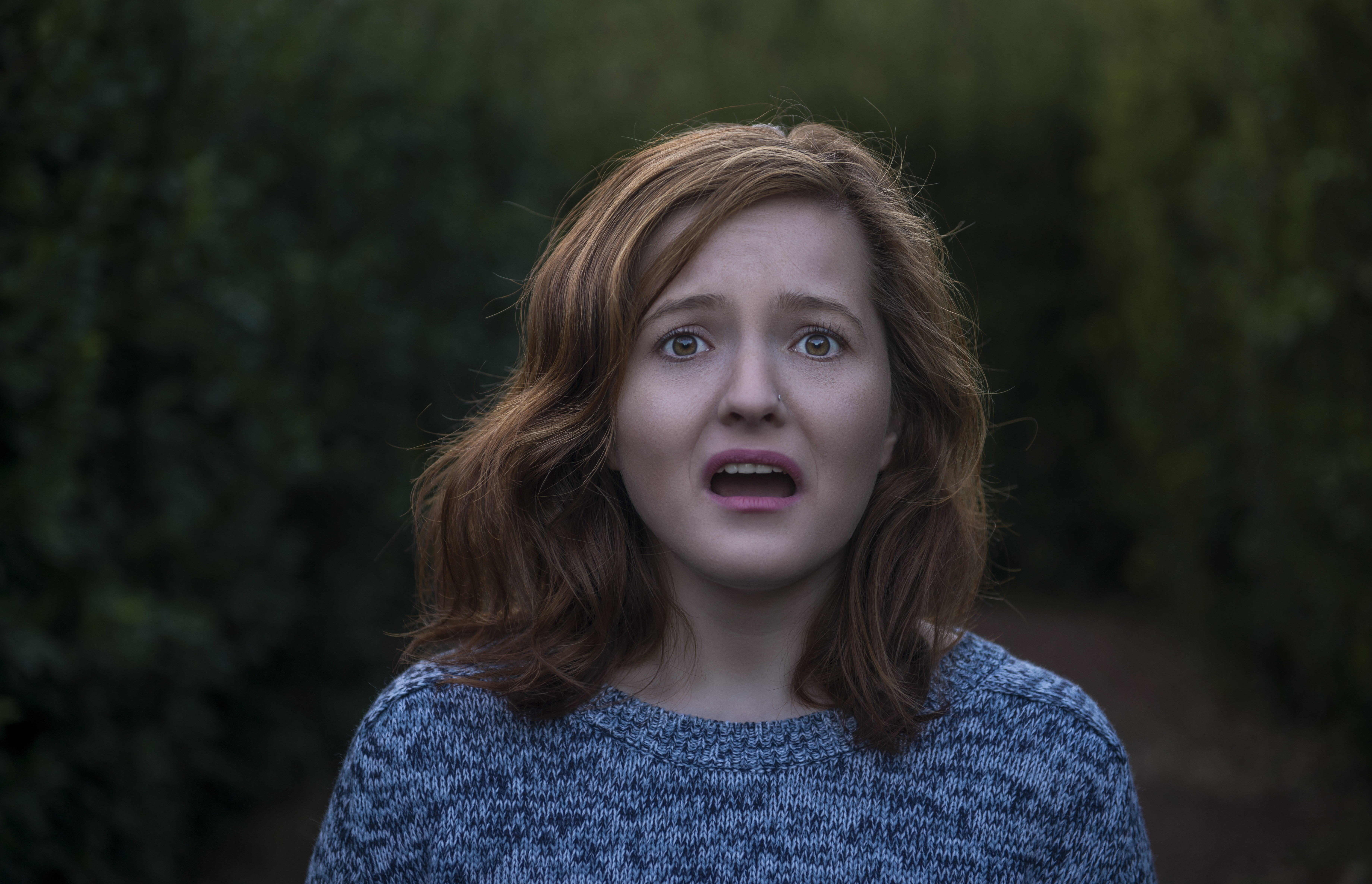 Portrait of shocked young woman looking at camera with negative facial expression | Source: Getty Images